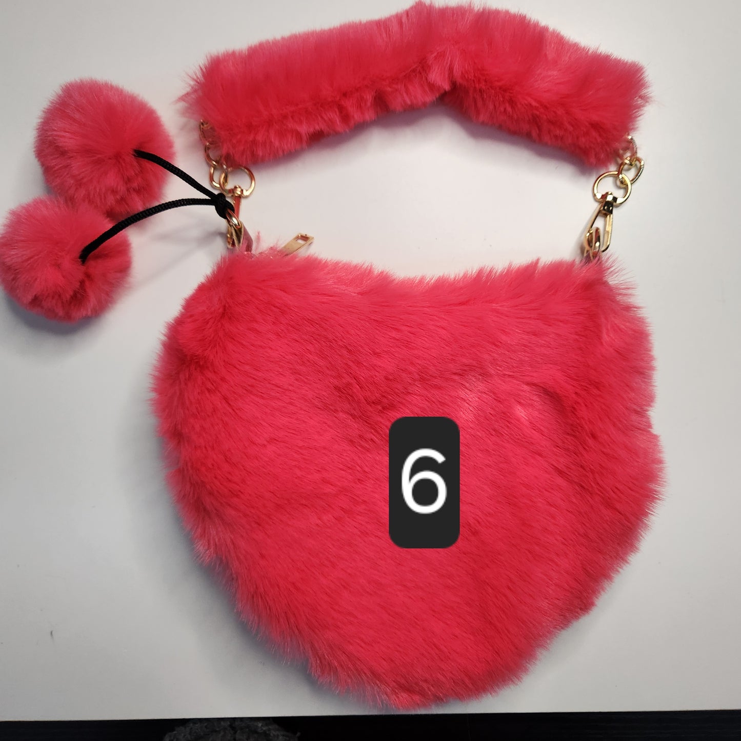 Sac fausse fourrure en coeur