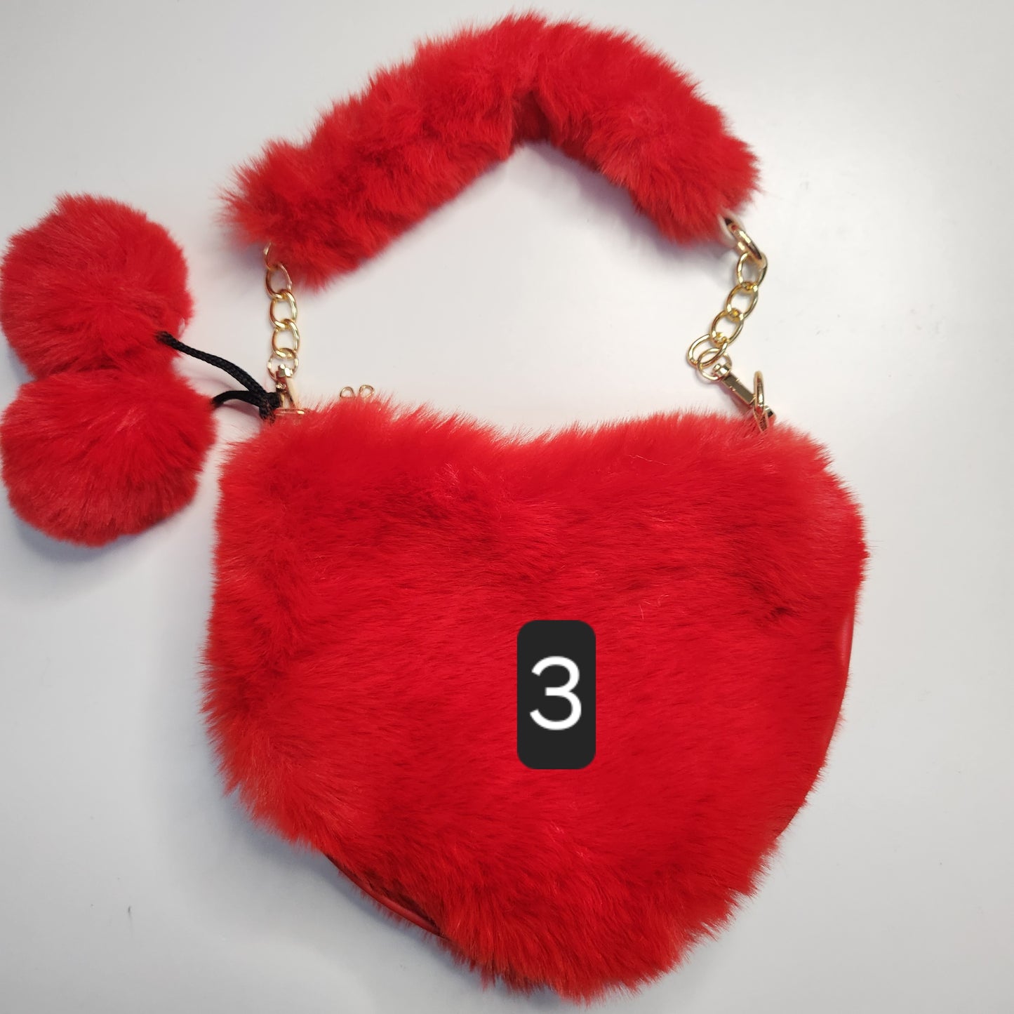 Sac fausse fourrure en coeur