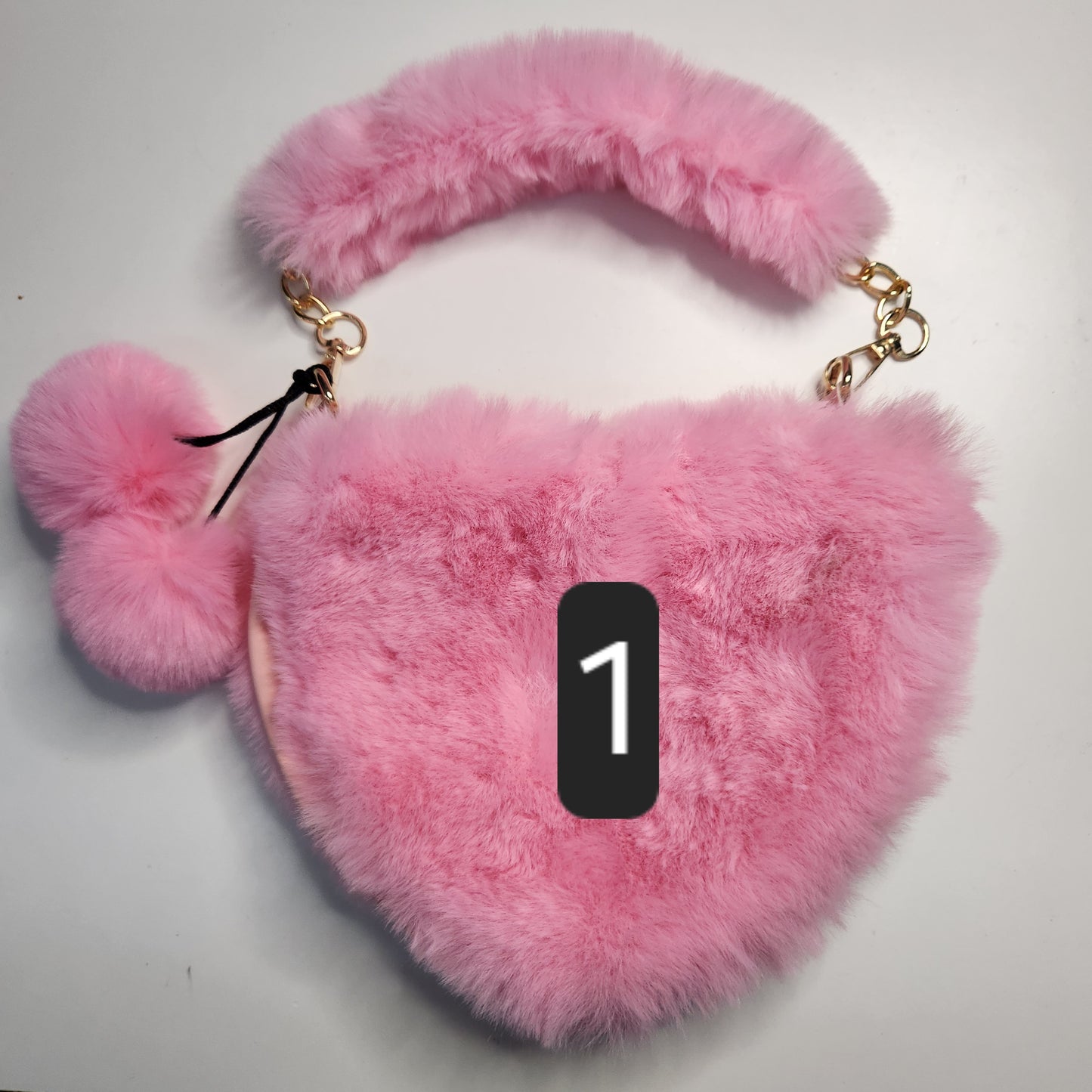 Sac fausse fourrure en coeur