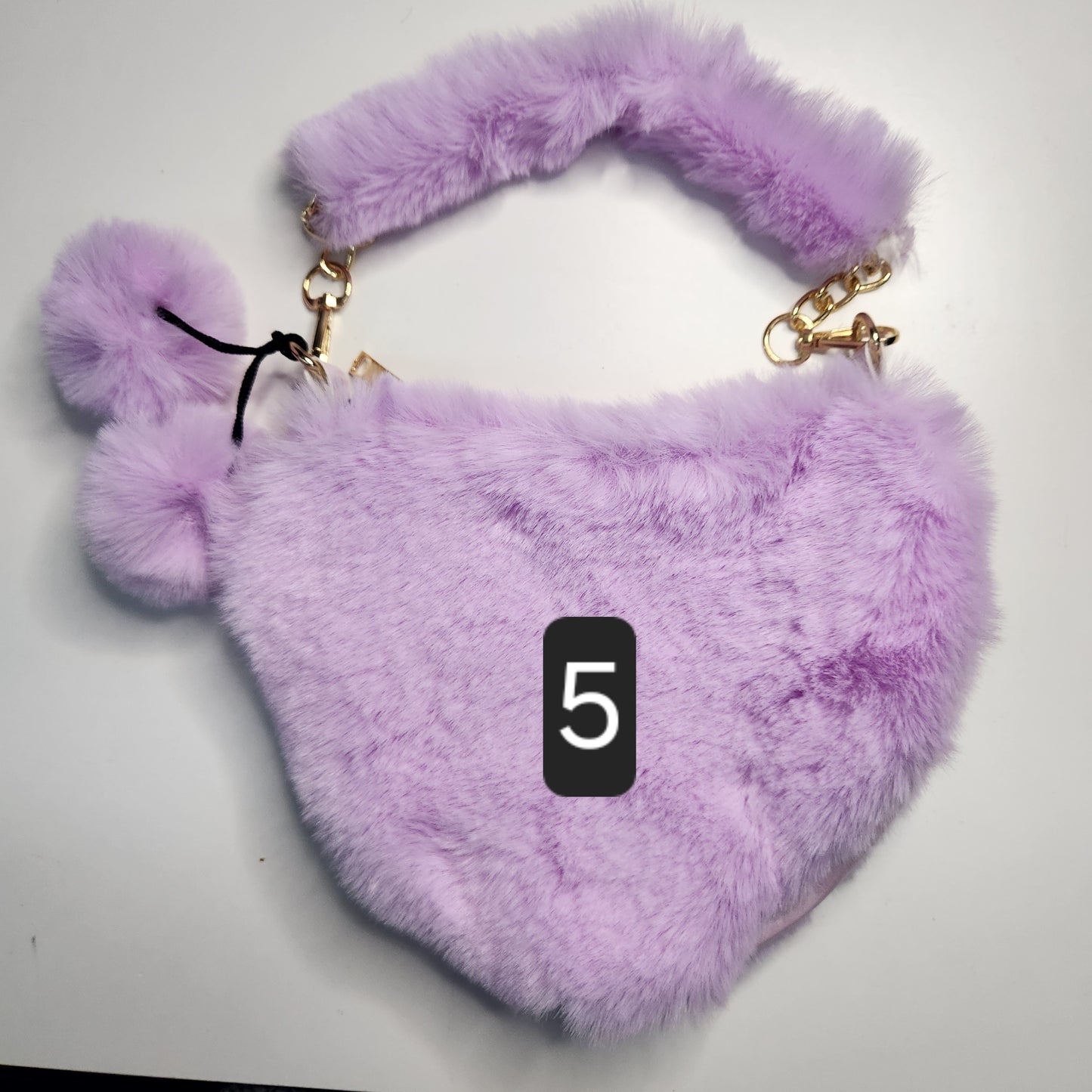 Sac fausse fourrure en coeur