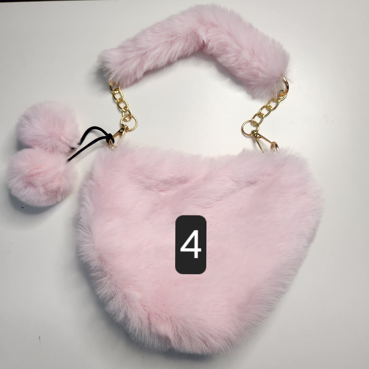 Sac fausse fourrure en coeur