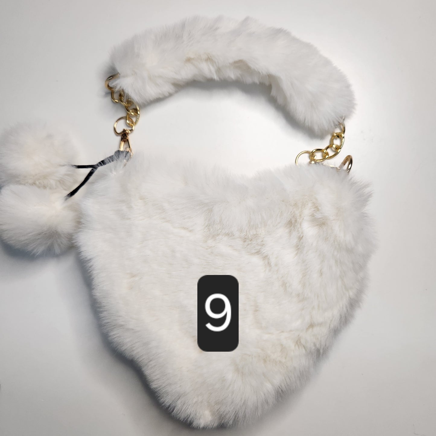 Sac fausse fourrure en coeur